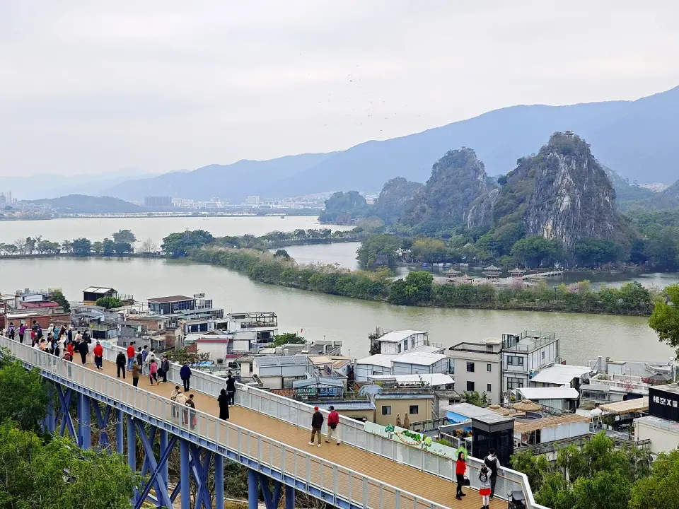 Star Lake, limestone hills and the Yanqian Trail boardwalk at Seven Star Crags in Zhaoqing